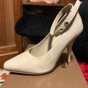 Burberry pumps. Like new! Just used twice.